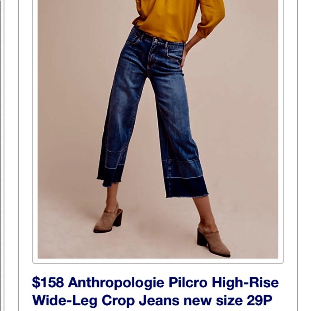 Anthropologie wide-legged cropped jeans.